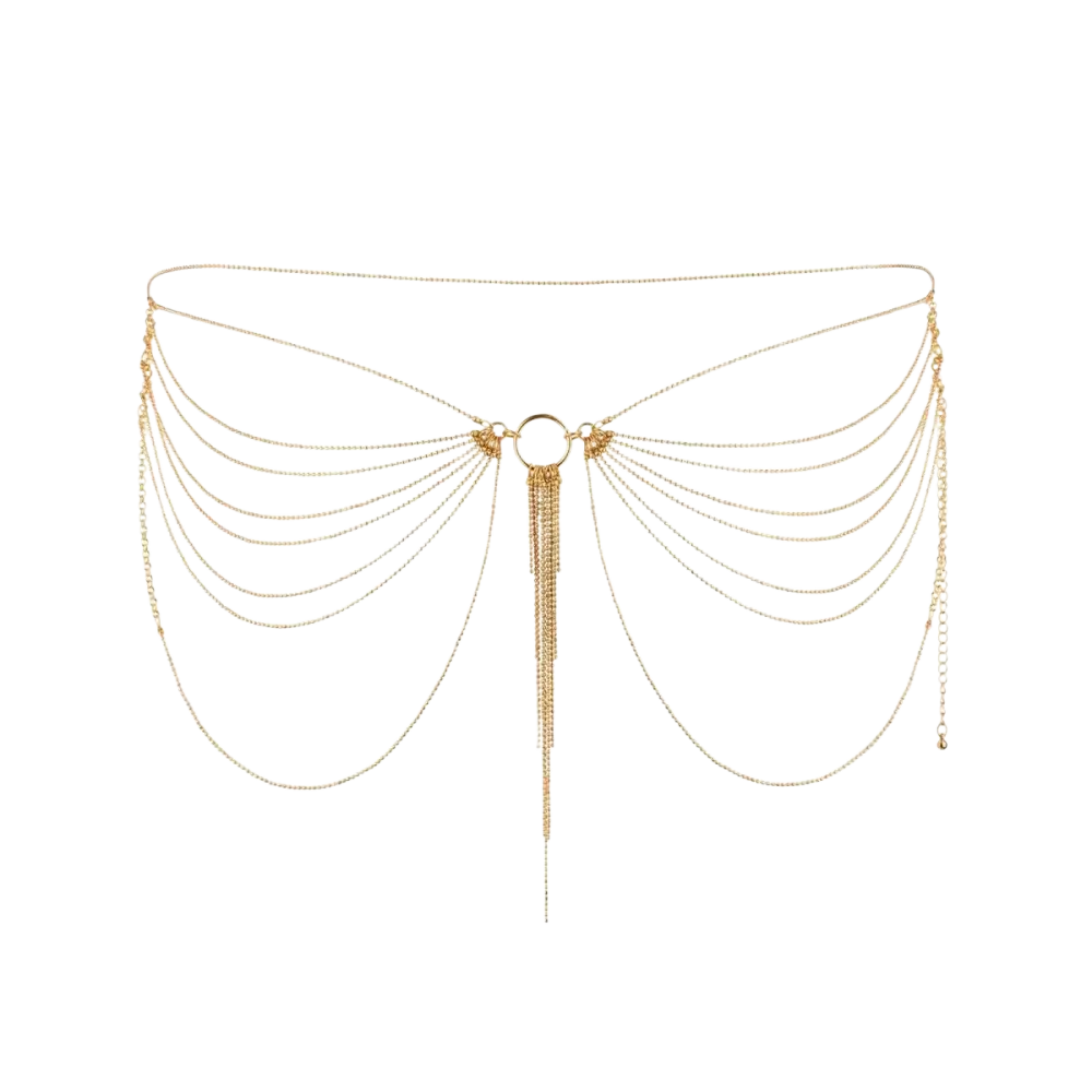 Chaîne corporelle en ton or avec plusieurs chaînes superposées et un pompon central pendant.