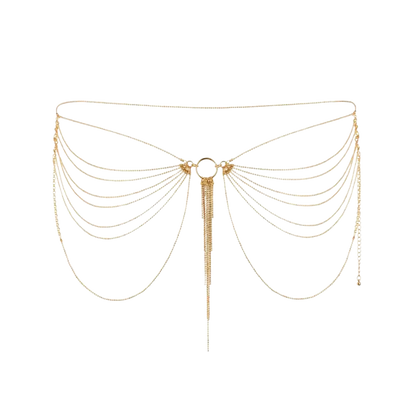 Chaîne corporelle en ton or avec plusieurs chaînes superposées et un pompon central pendant.