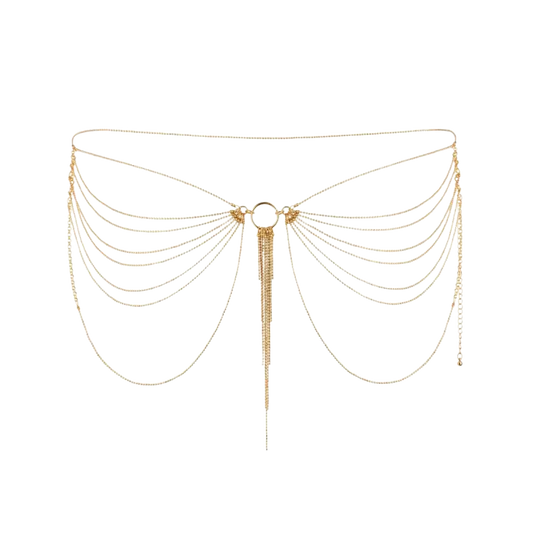 Chaîne corporelle en ton or avec plusieurs chaînes superposées et un pompon central pendant.